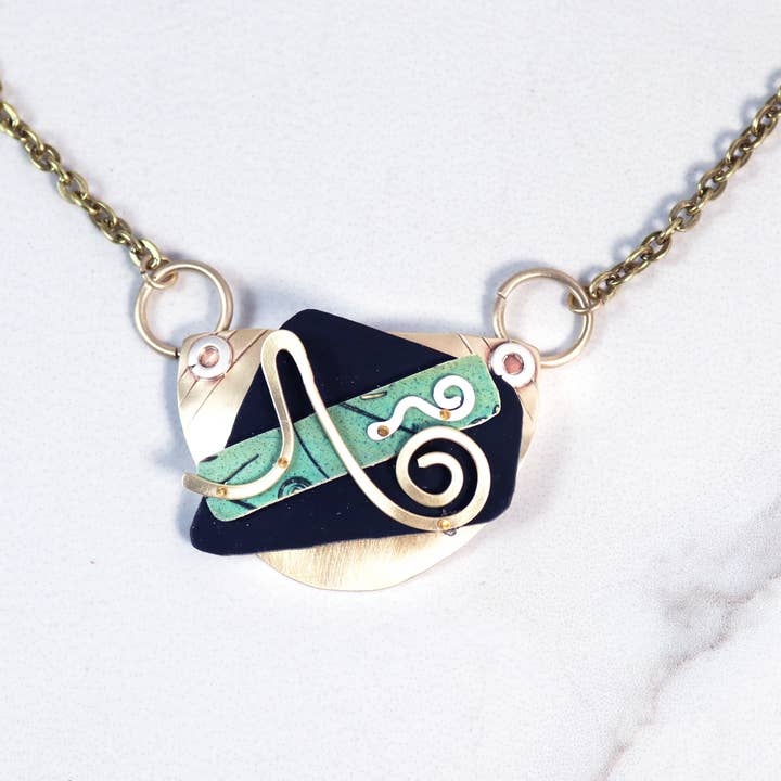 Splash of Delight Sterling, Brass and Polymer Clay Necklace for wholesale by Whitney Designs Ltd.