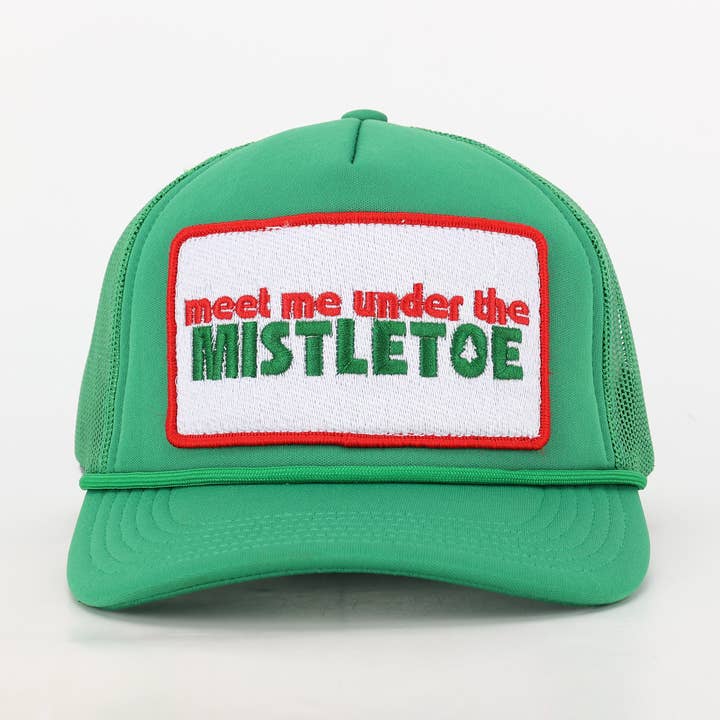 Meet Me Under The Mistletoe Trucker Hat in Green for wholesale on Faire0