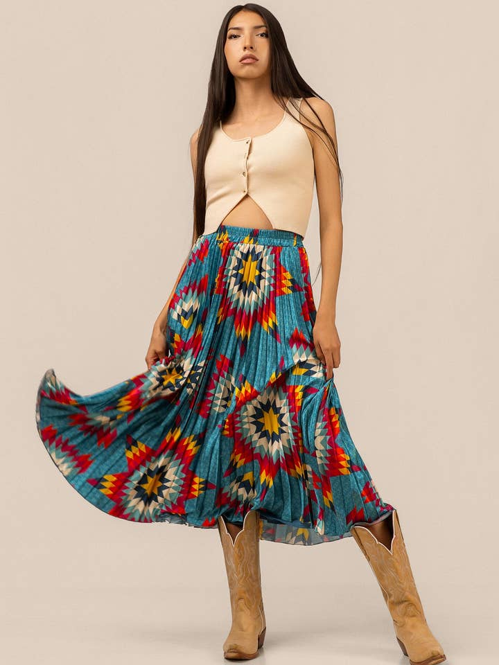 Jupe midi plissée - Turquoise pour la vente par B.Yellowtail