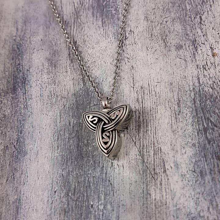 Trinity Knot Urn Pendant Necklace - Stainless Steel for wholesale by Just Vial