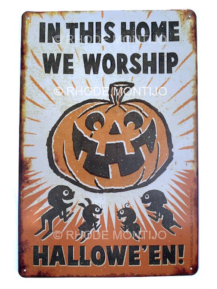 New! Decorate-Tin: In This Home We Worship Hallowe'en! Sign (Back In Stock!) for wholesale by The Fantasmical World of Rhode Montijo