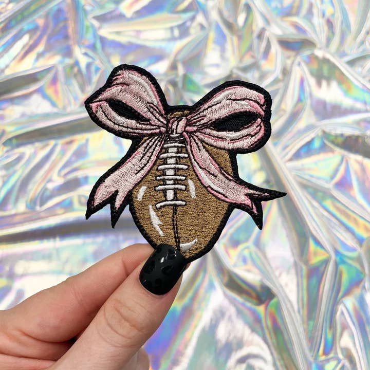 Football with Pink Bow Embroidered Patch Iron-On for Hats for wholesale by The Crafty Engineer