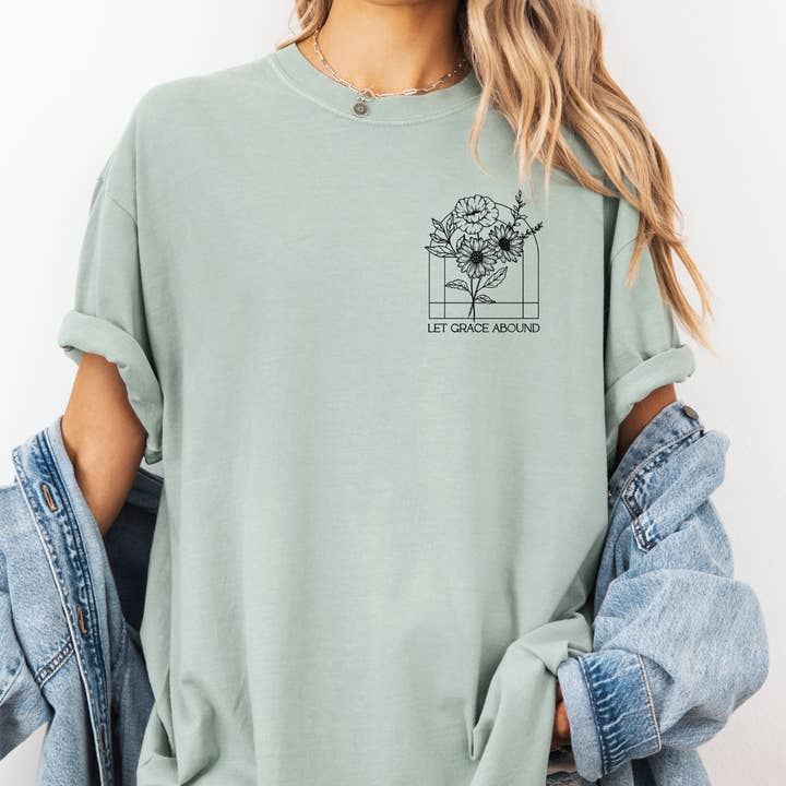Let Grace Abound Floral Arch Comfort Color Christian T Shirt for wholesale by Scripted Pearl