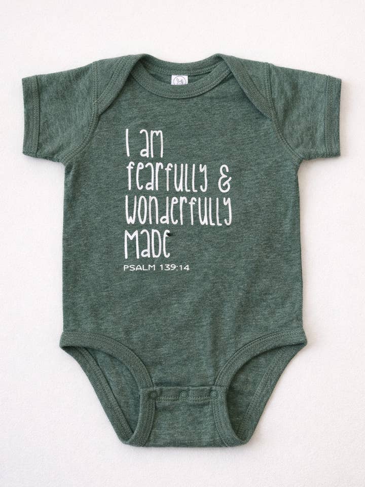 FEARFULLY & WONDERFULLY MADE BABY ONESIE for wholesale by Declarations By Beyond The Aisle