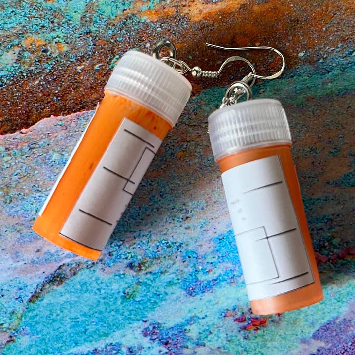 Orecchini a forma di flacone di pillole da prescrizione per la vendita all'ingrosso da parte di Sageware