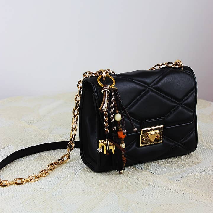 Golden Carousel Bag Charm – Elegant Multi-Functional Pendant and other Purchase Wholesale k carroll accessories. Free Returns & Net 60 Terms on Faire trending on Faire.