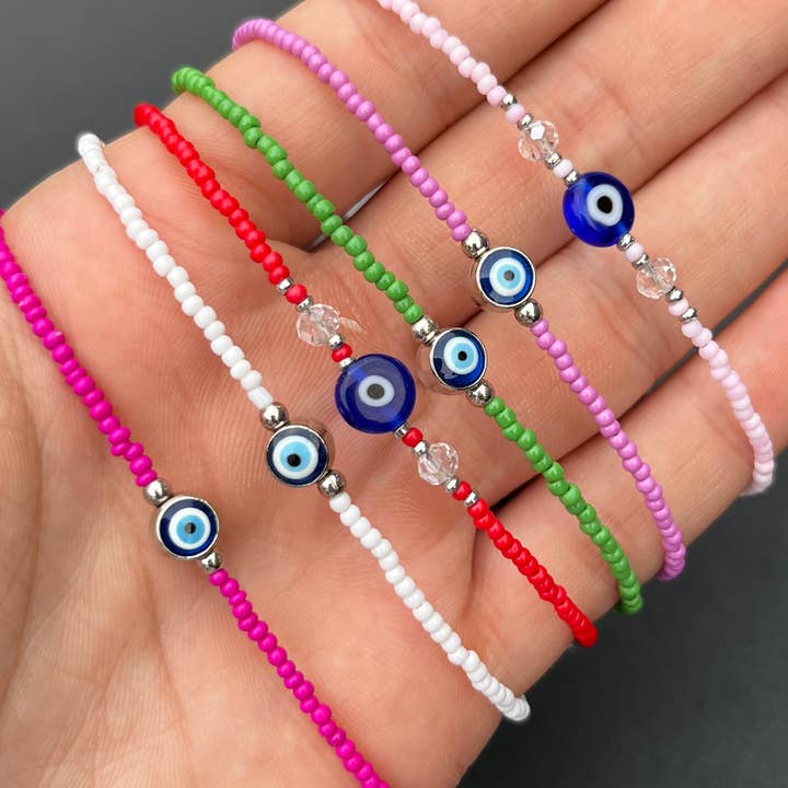 Bracelet en cristal | Breloque œil protecteur en perles | 7 options de couleur pour la vente par Loli