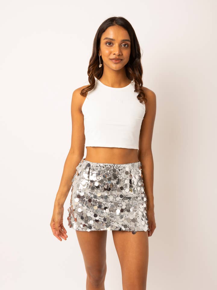 OCEANE SILVER DISC MINI SKIRT for wholesale by Amy Lynn
