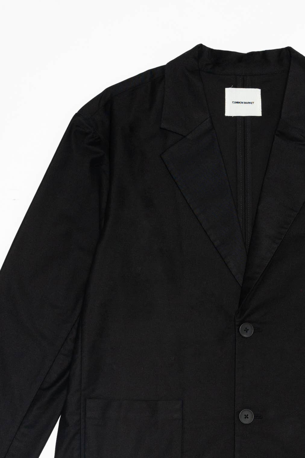 SCHWARZ Der Abel Blazer – Locker geschnittener, einreihiger Blazer aus Baumwollmischung für den Großhandel auf Faire7