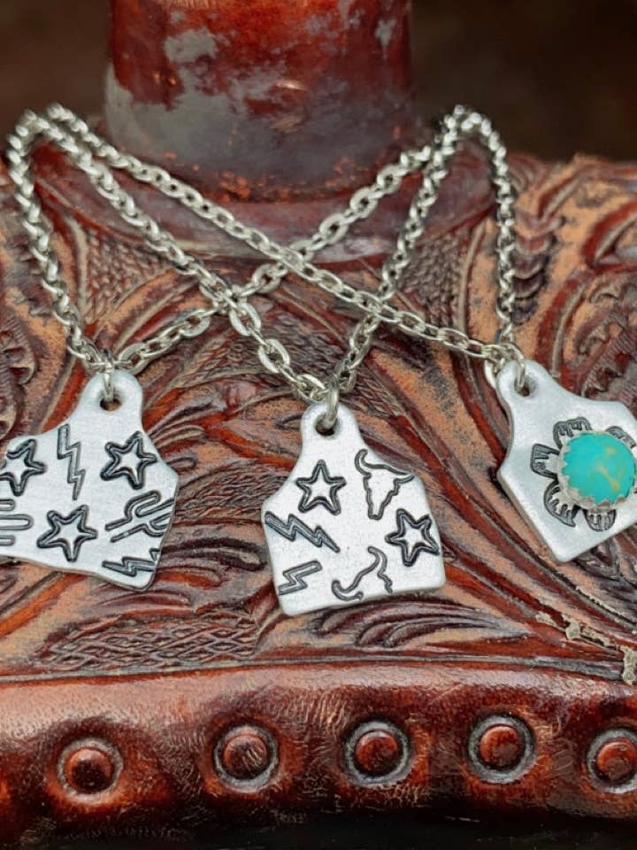 Cosmic Cowboy Cow Tag Necklace for wholesale by Diamond Basin Design Co.