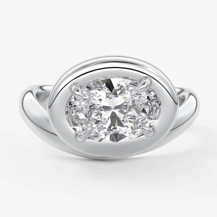 Chunky Oval Cut Collet Engagement Ring for wholesale by Caratina