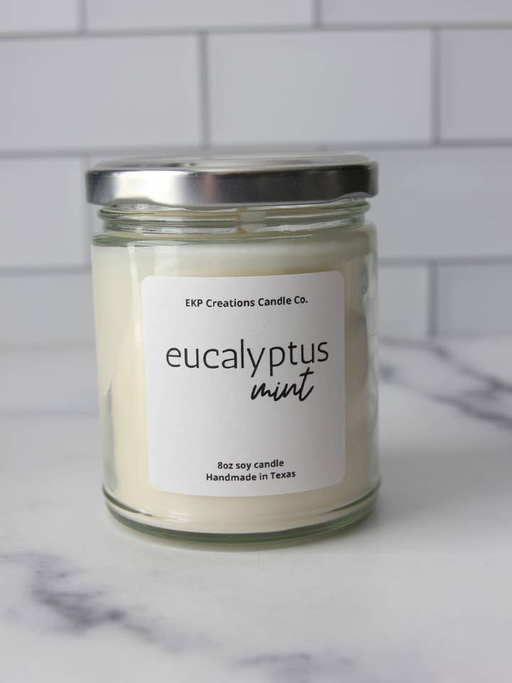 Eucalyptus Mint: 8oz Clear Jar Soy Candle for wholesale by EKP Creations Candle Co