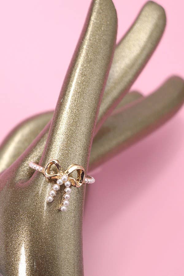 GOLD PEARL BOW RIBBON RING | 31R24004 for wholesale on Faire2