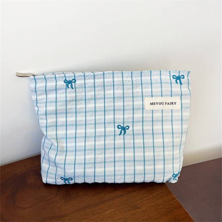 Bow embroidery Large capacity portable cosmetics bag for wholesale by Little Trendy