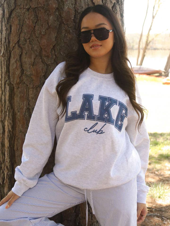 ÉQUIPE DU CLUB DU LAC pour la vente par CHARLIE SOUTHERN