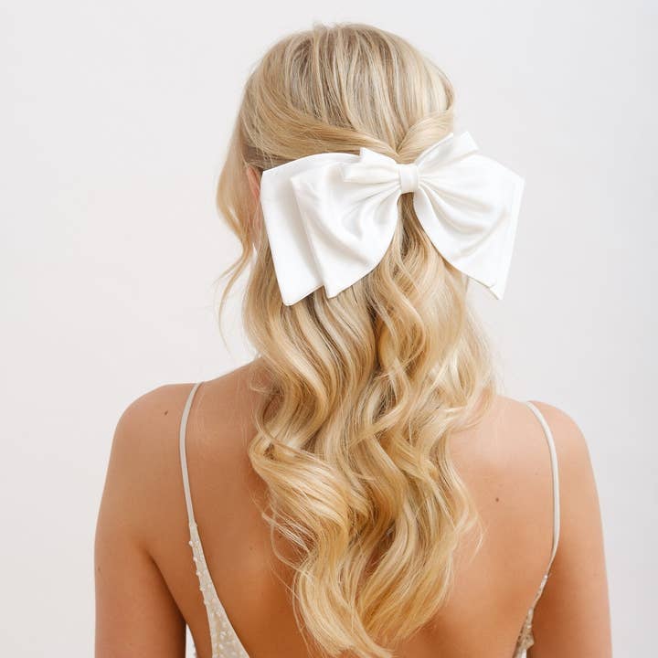 LOTTIE // Large white satin bow, bridal hair bow, wedding hair accessory, bachelorette hair clip for wholesale by Emilia Rae Jewellery