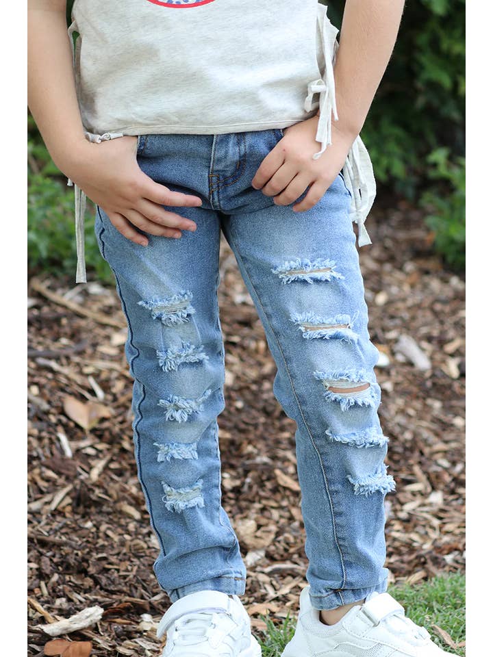Kids Charm Online - Wholesale Jeans - Kids - LIGHT BLUE RIPPED SKINNY JEANS. PNG25113066-AMY
