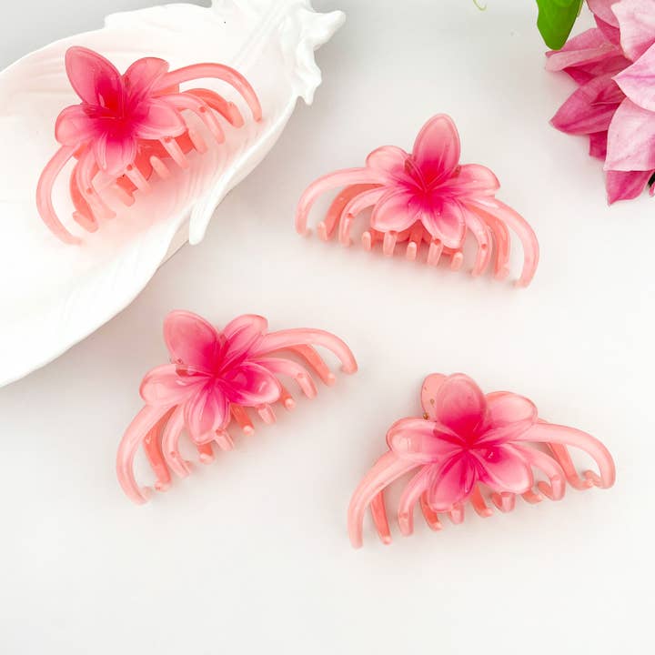 Pink Plumeria Flower Plant Acetate Hair Claw Clip and other Purchase Wholesale resin flowers. Free Returns & Net 60 Terms on Faire trending on Faire.