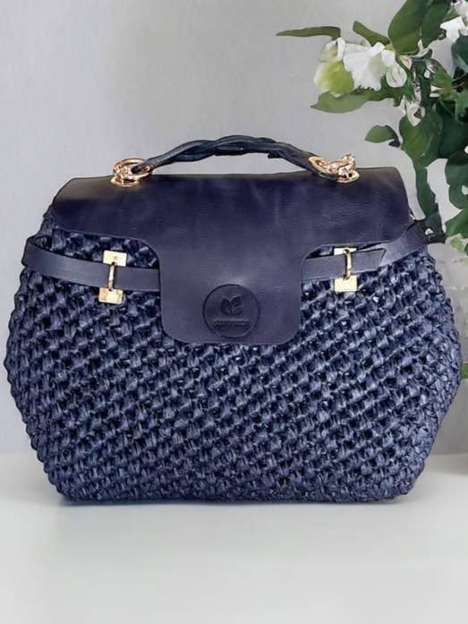 Sac à main en raphia crocheté à la main avec détails en cuir pour la vente par DesignofBoho