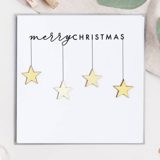 Tarjeta de estrellas colgantes de madera Feliz Navidad para venta al por mayor de Jodie Gaul & Co