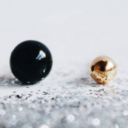 Ohrringe mit Elementarteilchen für den Großhandel von Fauna y Flora