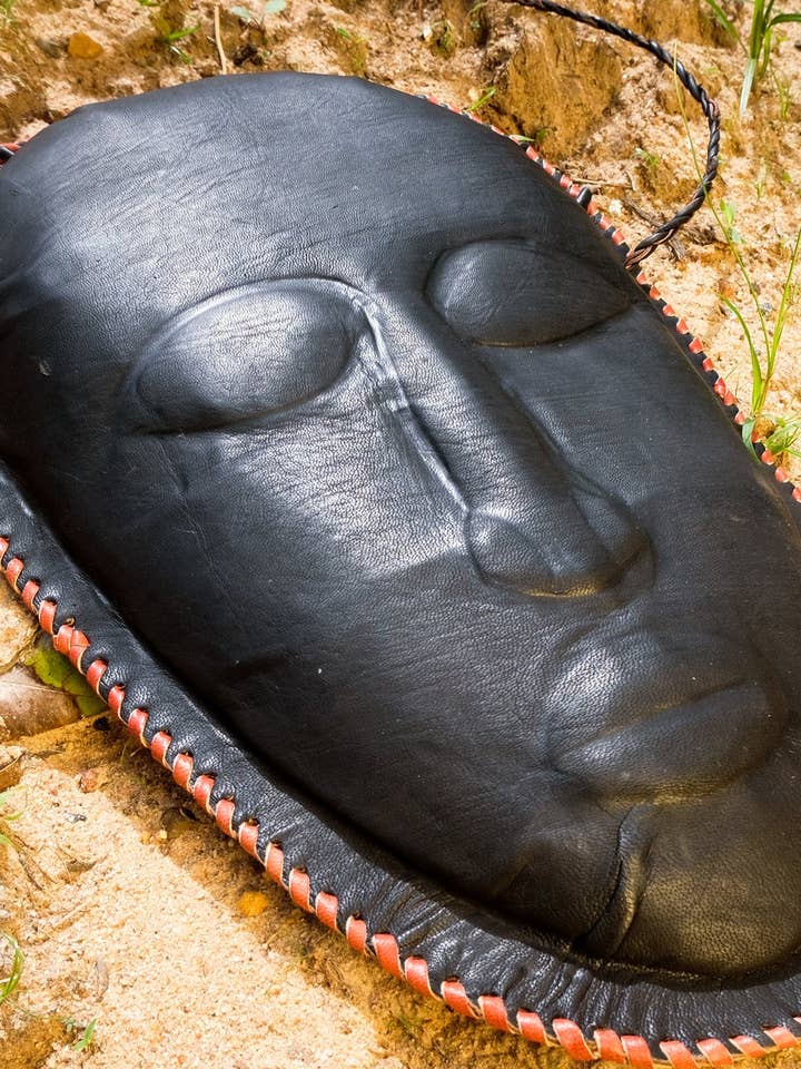 LEATHER MASK BAG | BLACK HANDMADE IN AFRICA ARTISANAL CRAFT BAG for wholesale by BATIK BOUTIK