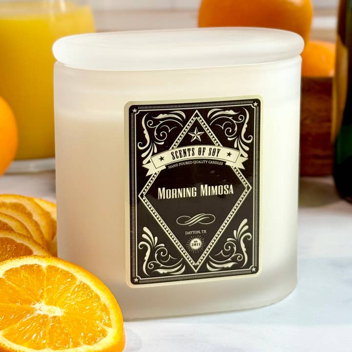 Morning Mimosa Frosted Oval Glass Soy Candle for wholesale by Scents Of Soy Candle Company