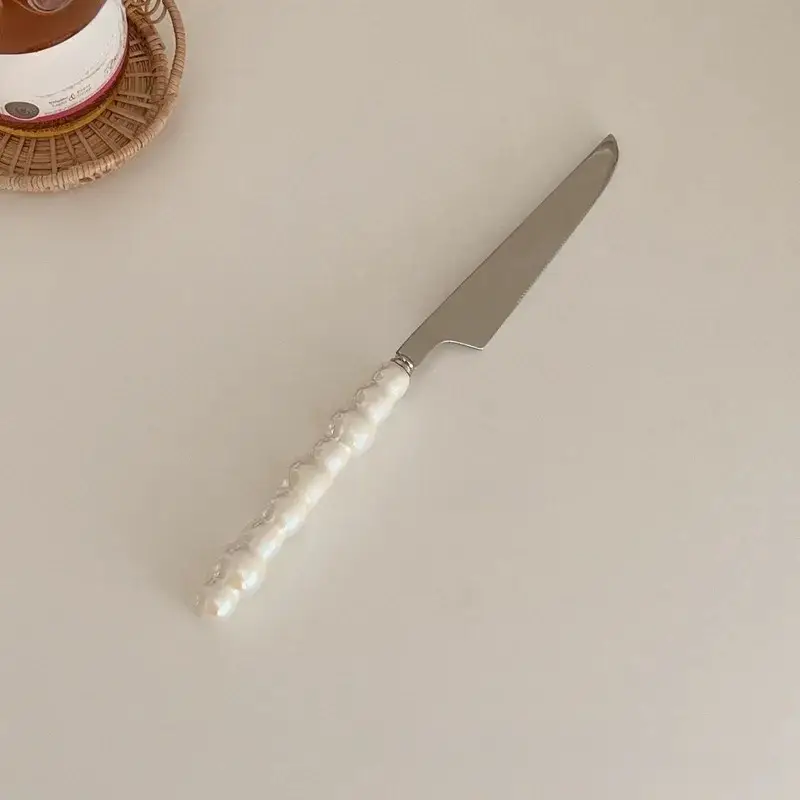 Otterware - Wholesale Flatware Set - Elegant Pearl Ceramic Handle Stainless Steel Flatware1