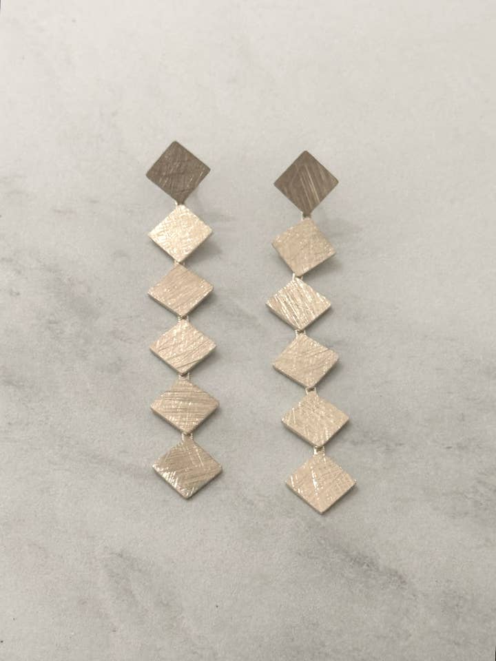 Diamond Form Brushed Silver Dangle Earrings for wholesale by Cassette Barcelona