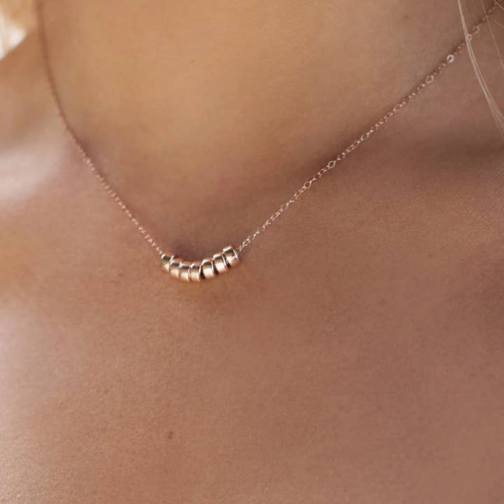 Seven Ring Necklace- 14k Rose Gold - Classic for wholesale on Faire1