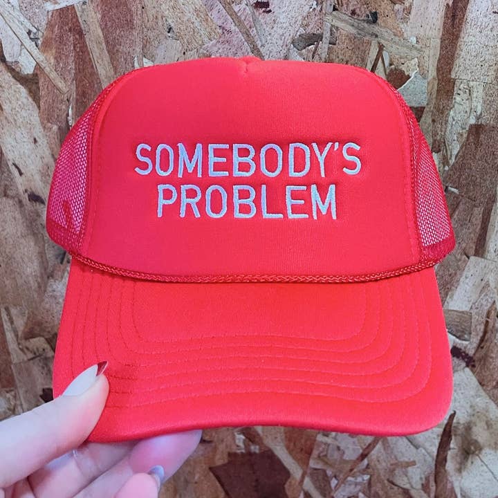 Somebody's Problem Trucker Hat: Embroidery for wholesale by Vanilla