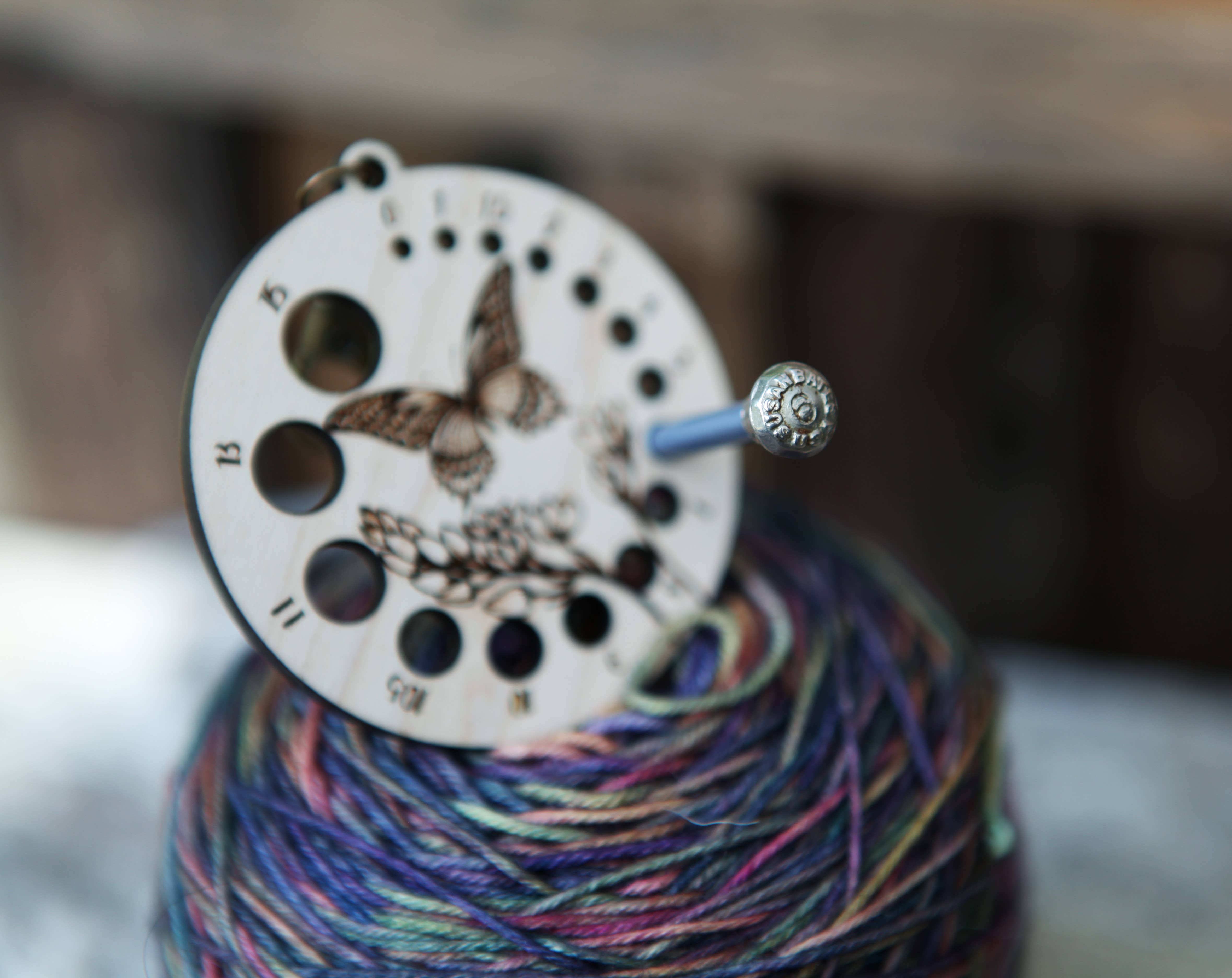 Sunrise Grove - Wholesale Knitting/Crochet Supplies - Butterfly with Flower Needle Gauge with Bronze Clasp 6