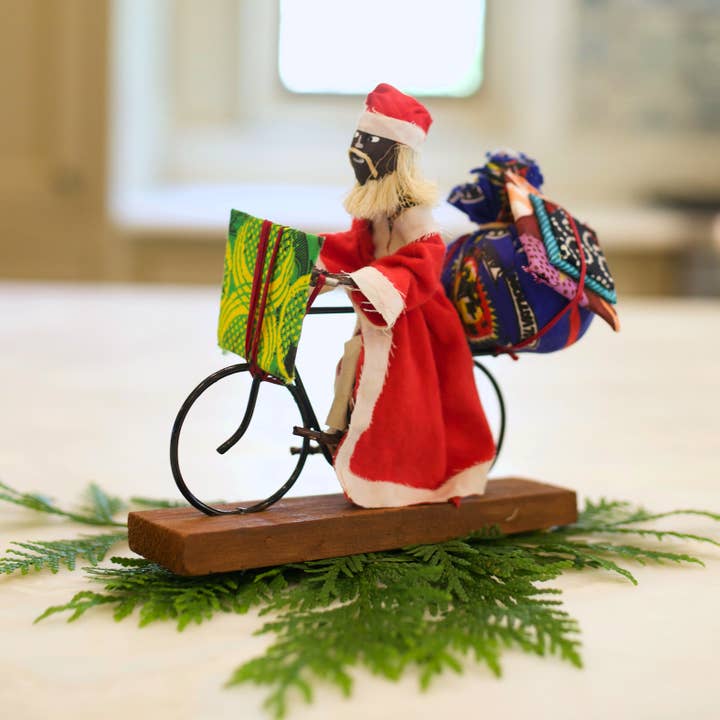African Santa Figurine Riding Bike for wholesale by Ornaments 4 Orphans