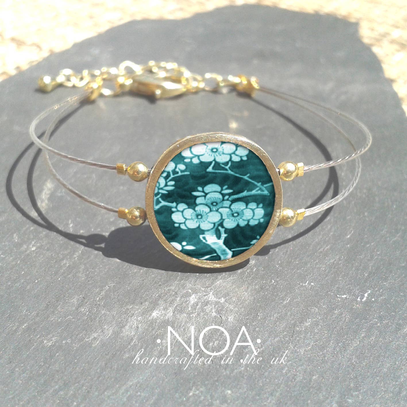 Noa Jewellery – wholesale Charm/dangle bracelet – Round Ceramic Bracelet, Gold Plated Stainless Steel Frame14