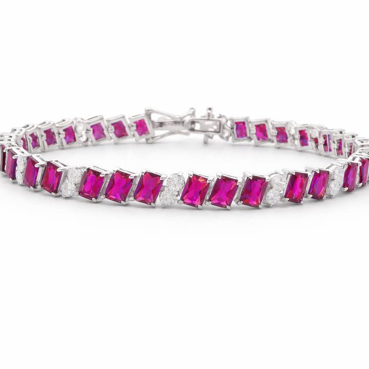 Tennisarmband i sterlingsilver med färgade CZ-stenar i radiant cut (7,25"). för wholesale av Atlanta Jewelers Supply
