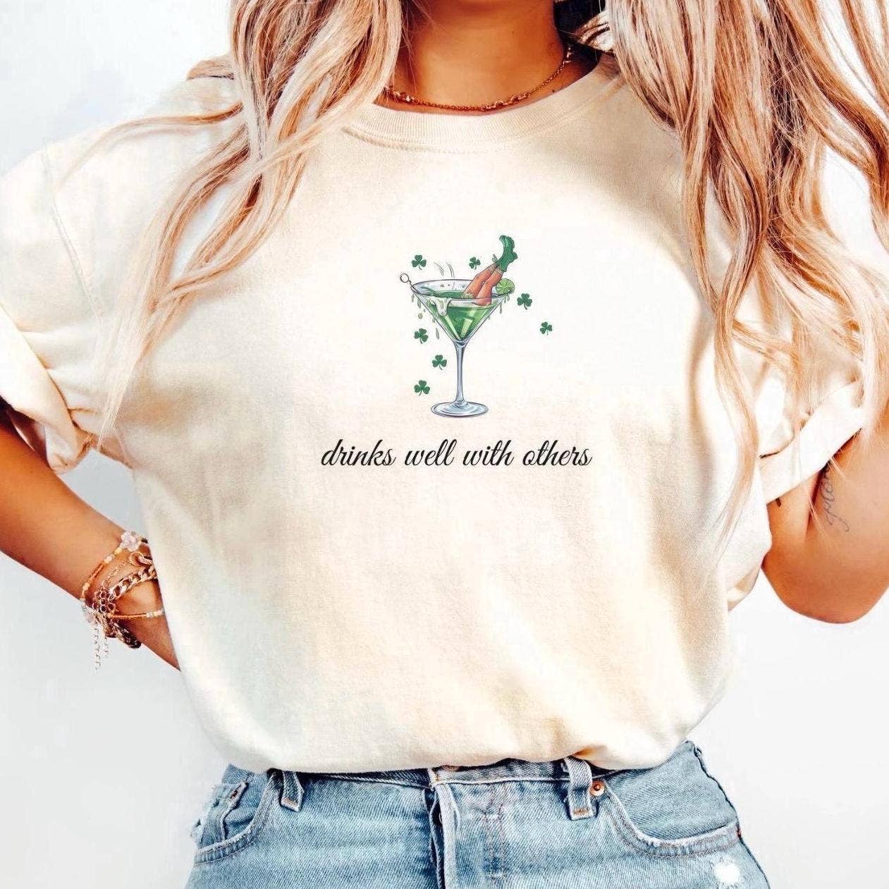 NVC Ecommerce LLC – wholesale Graphic sweatshirt – Women’s – Drink Well With Others Tee, Leprechaun Martini Drink Sweater0