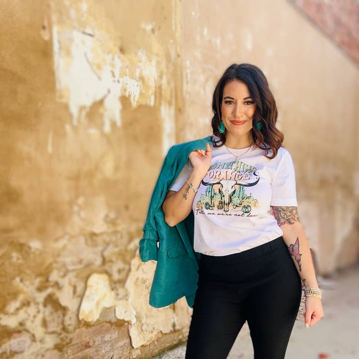 Something In The Orange Graphic T-Shirt and other Purchase Wholesale zach bryan t shirt. Free Returns & Net 60 Terms on Faire trending on Faire.