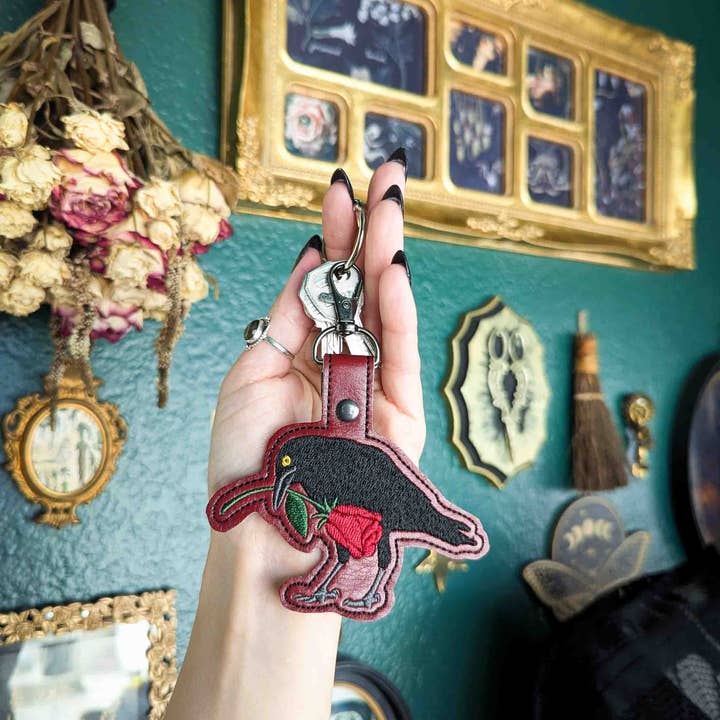 Raven and Rose Embroidered Keychain - Deep Red Faux Leather with Gunmetal Hardware for wholesale by Project Pinup