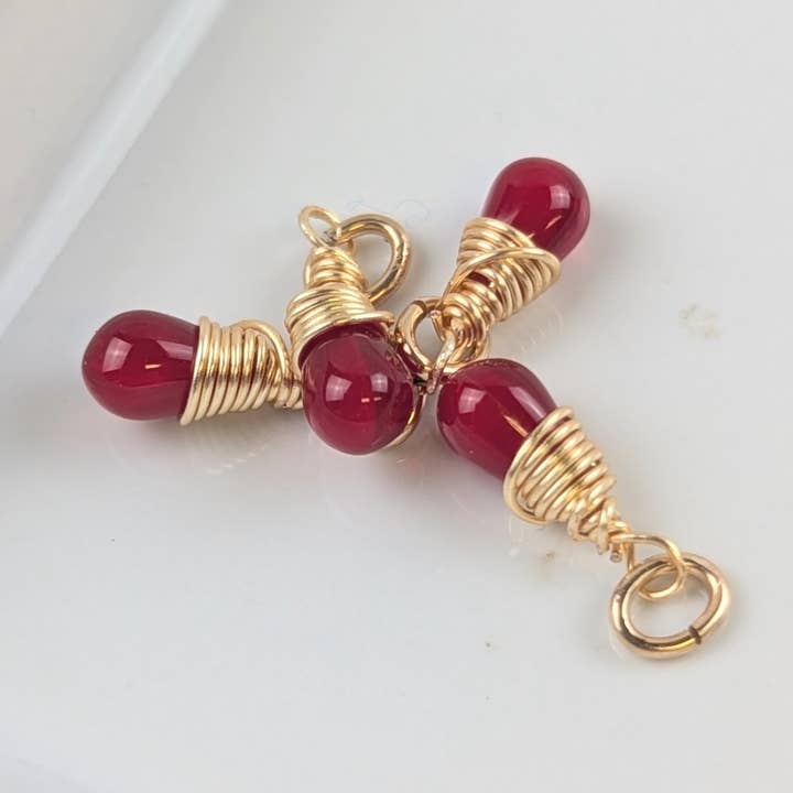Empowerment Red Czech Glass Charms in Gold - Pack of 4 for wholesale by Forai