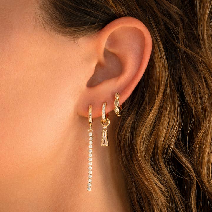 Gold Carlotta earrings for wholesale on Faire1