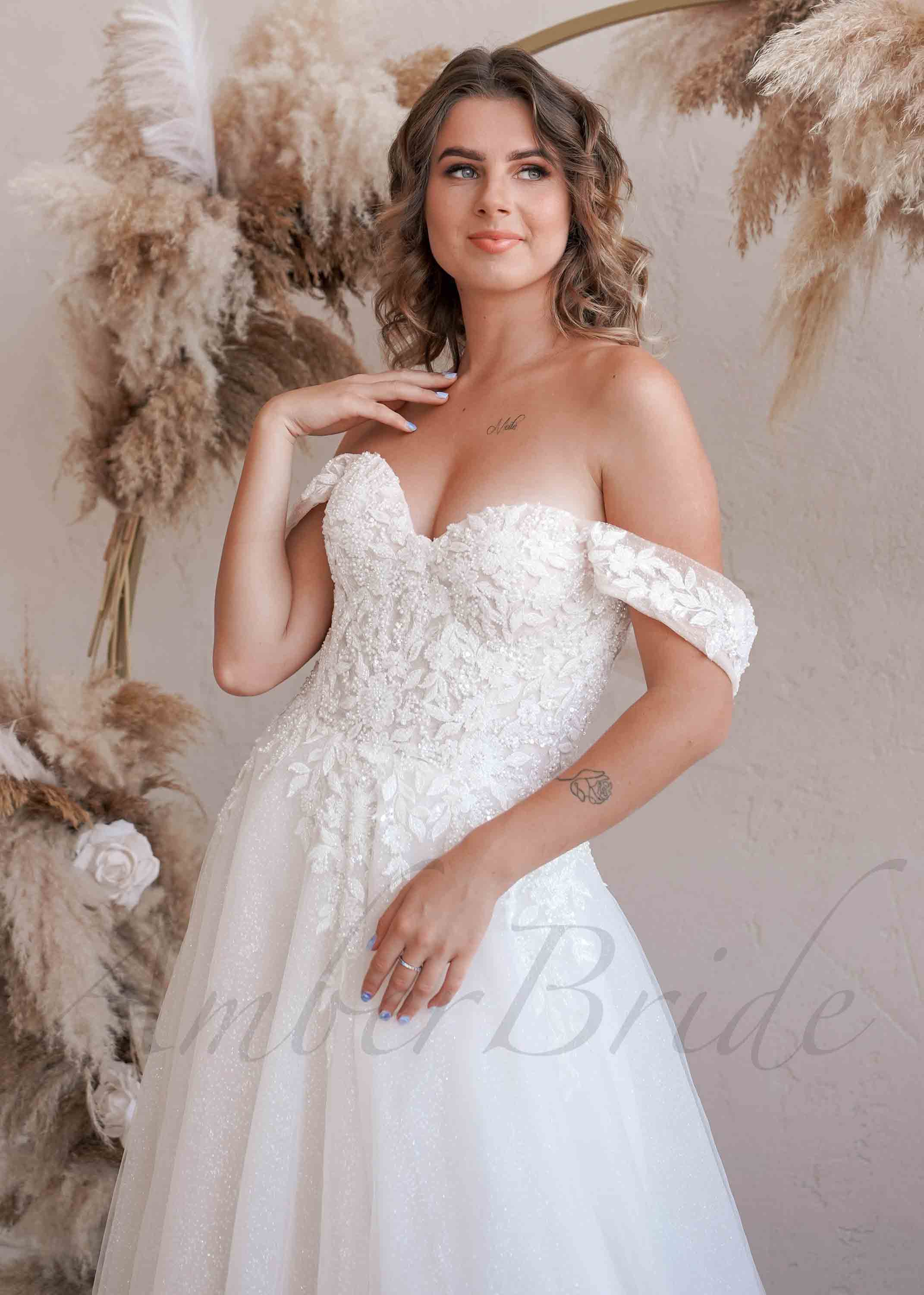 Amber Commerce Group, MB - Wholesale Gown - Women's - Exclusive Off Shoulder Glittery Wedding Dress with Floral Design and Corset1