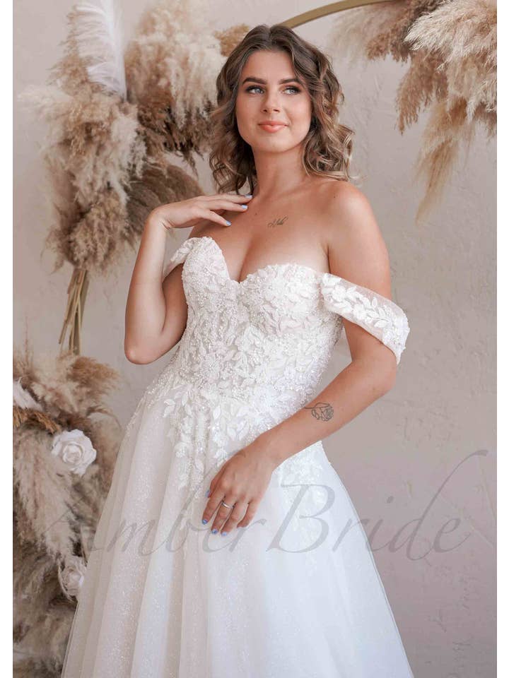 Amber Commerce Group, MB - Wholesale Gown - Women's - Exclusive Off Shoulder Glittery Wedding Dress with Floral Design and Corset1