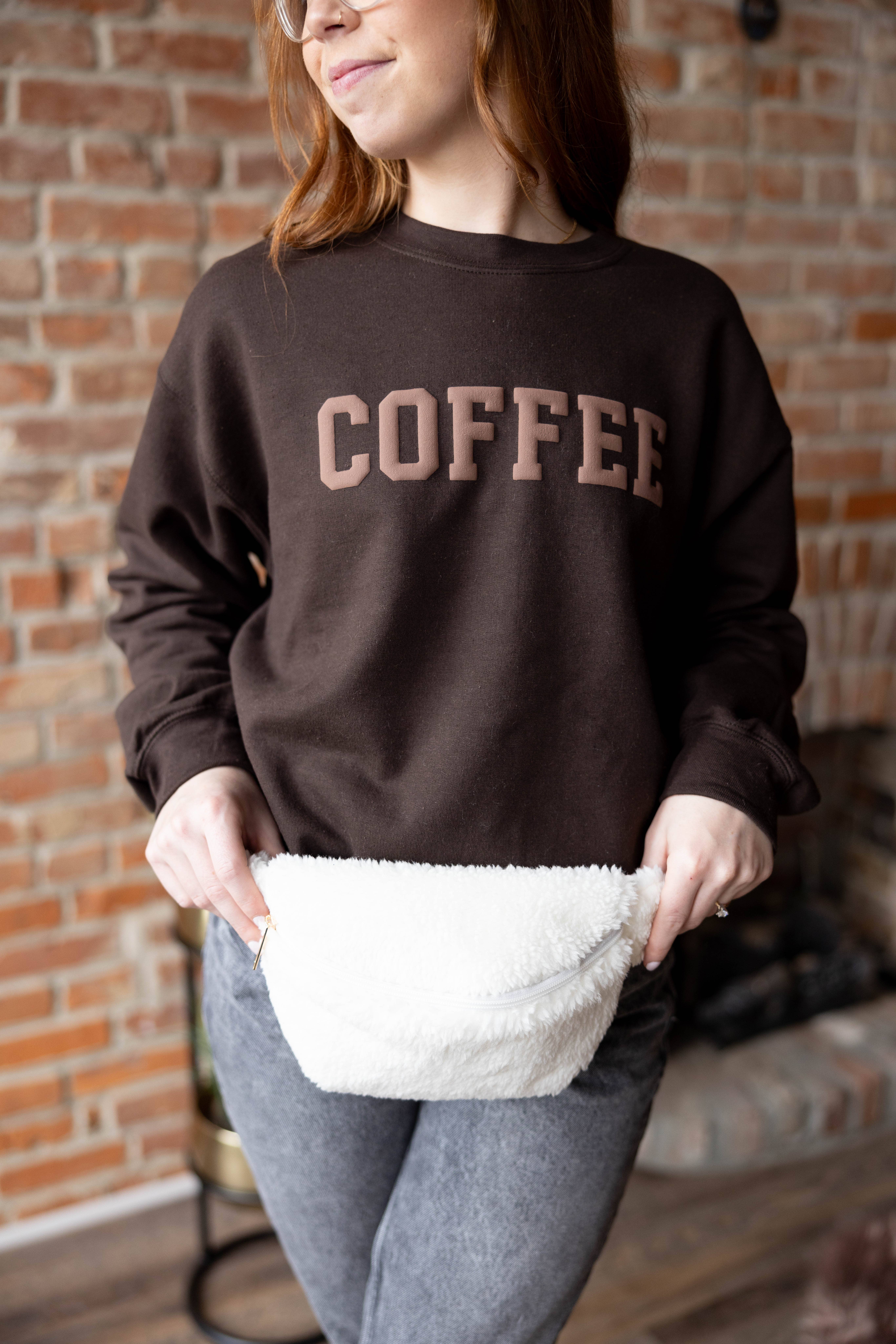 Bruin Bruine sweater met koffiemeliëf en poftekst voor dames voor groothandel op Faire1