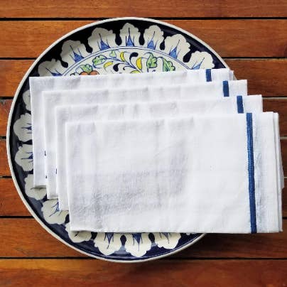 White cotton napkins embroidered with blue border - set of 4 for wholesale by Indigostep