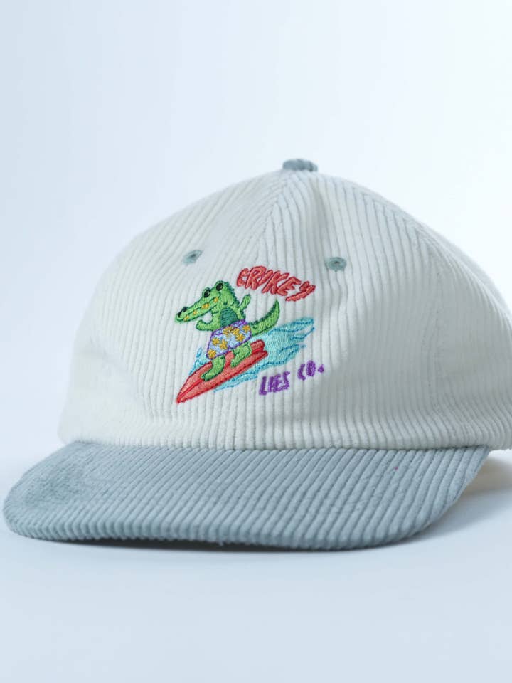 SURFING GATOR LID for wholesale by Lies Collective