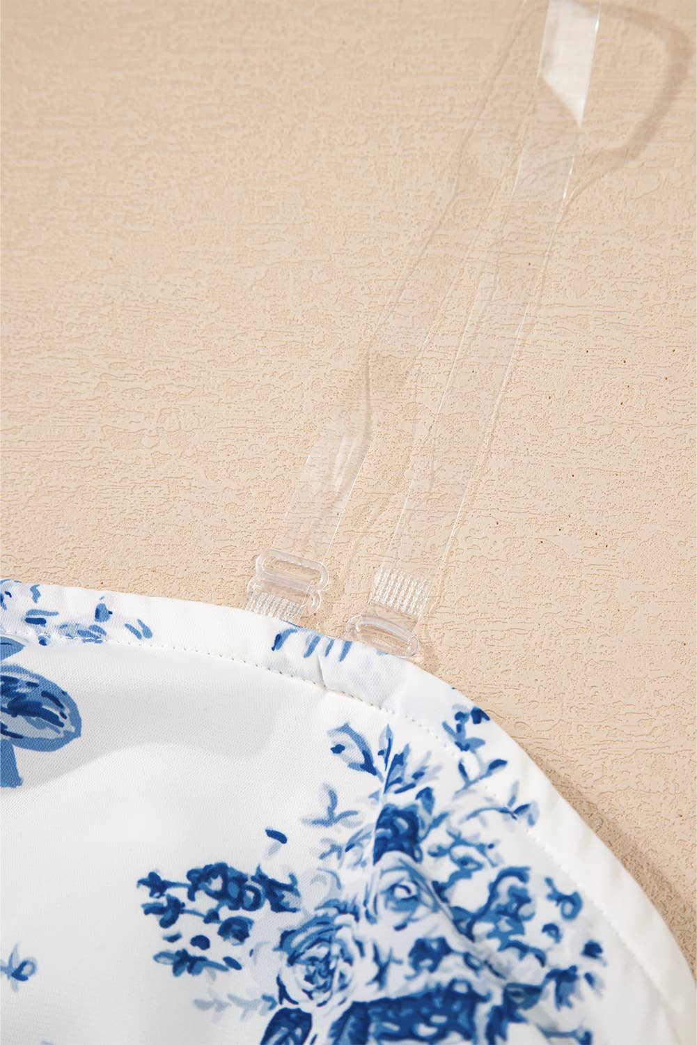 Blue Floral Print Strapless Zipped Back Knot Waist Ruffled Romper for wholesale on Faire8