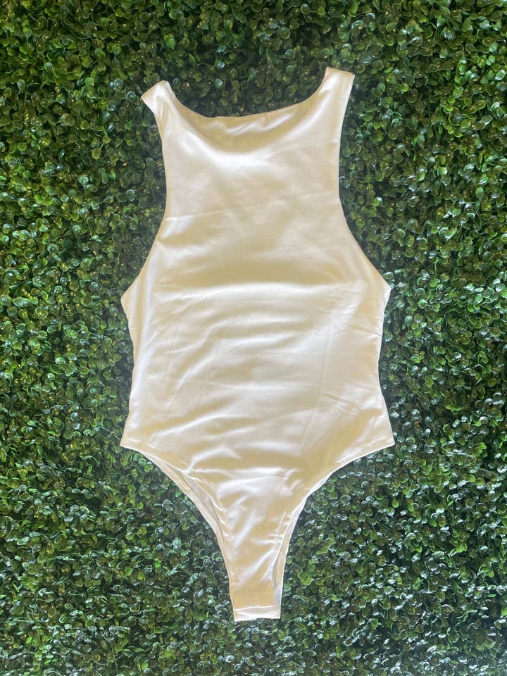 Body elegante con bottoni a pressione per la vendita all'ingrosso da parte di Frayed