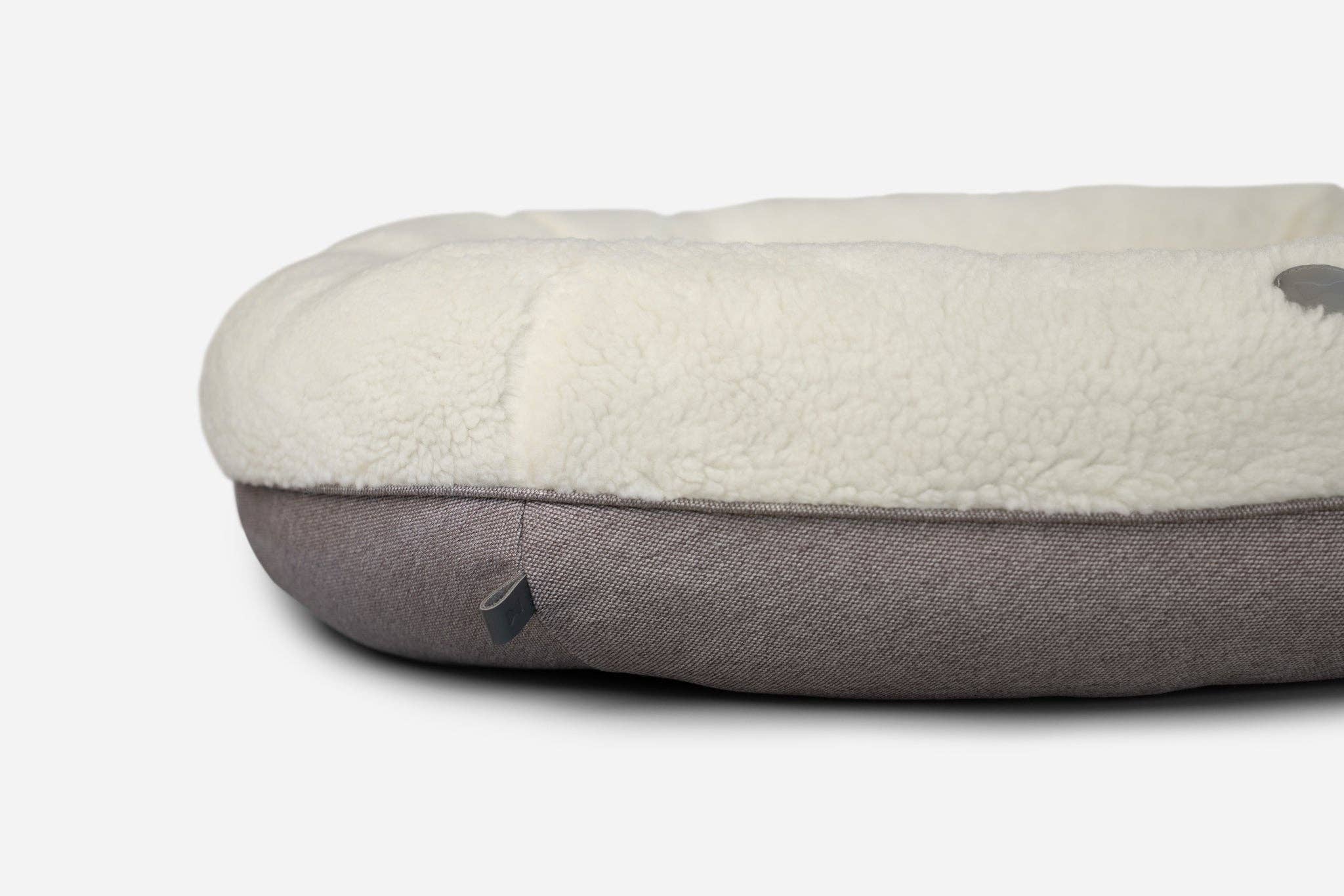 Beige Letto per cani a ciambella beige peloso in vendita all'ingrosso su Faire5