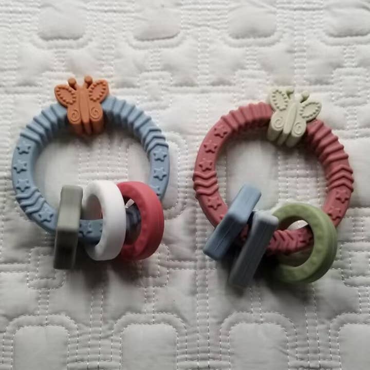 Silicone Butterfly Teething Ring + Rattle for wholesale by D & C TOYS