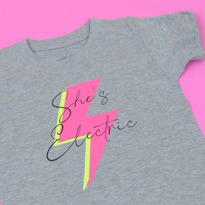Rocket & Rose Ltd – wholesale Screen-printed t-shirt – Kids – 'SHE'S ELECTRIC' KIDS T SHIRTS RRP £13.991